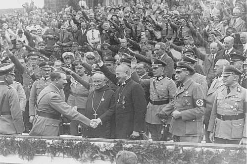  Adolf Hitler greets Reich Bishop Ludwig Mueller at a Nazi Party Congress.