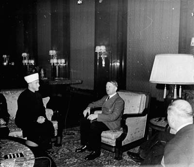The former Mufti of Jerusalem, Hajj Amin al-Husayni, meets Hitler for the first time. [LCID: hof42552]