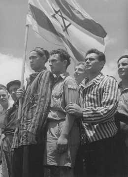 <p>Concentration camp survivors aboard the Aliyah Bet ("illegal" immigration) ship "Mataroa" arrive at the Haifa port. The British denied them entry and deported them to Cyprus detention camps. Palestine, July 15, 1945.</p>