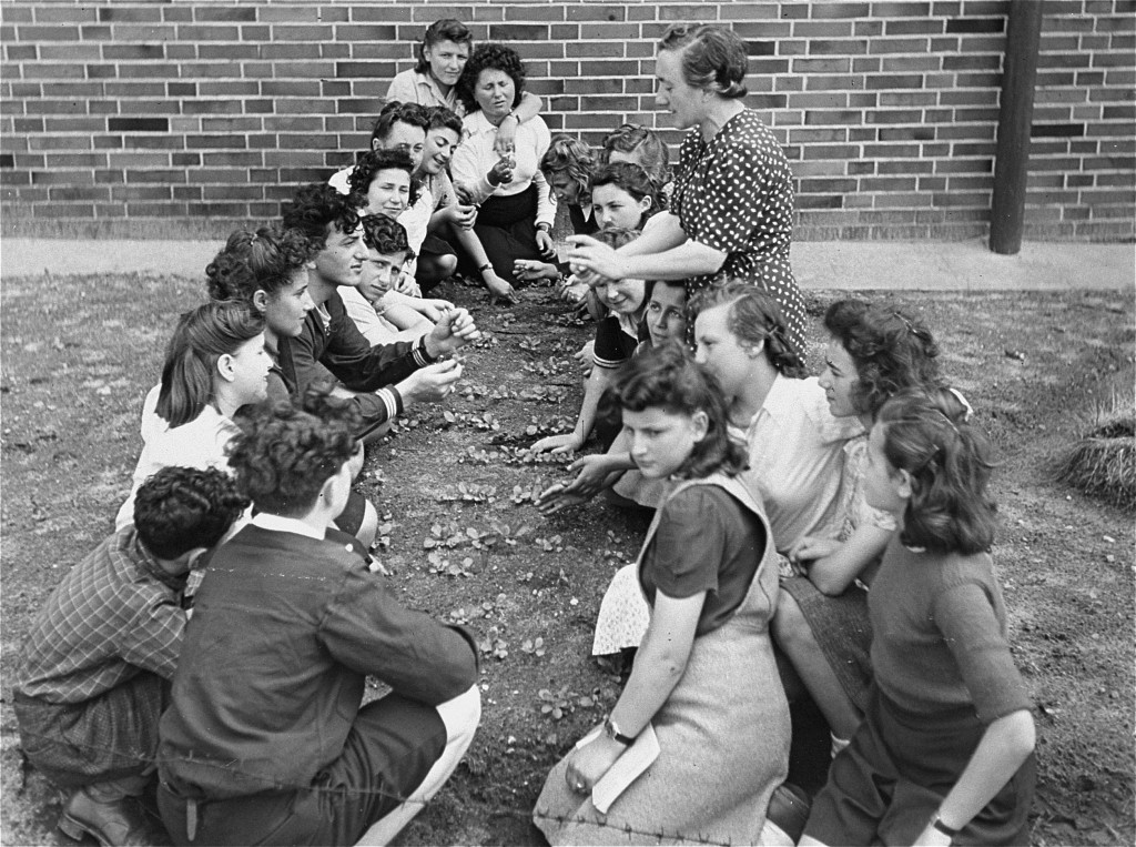 Jewish youth attend a class on transplanting seedlings, part of a general course in farming sponsored by the American Jewish Joint Distribution Committee at the Bergen-Belsen displaced persons camp.