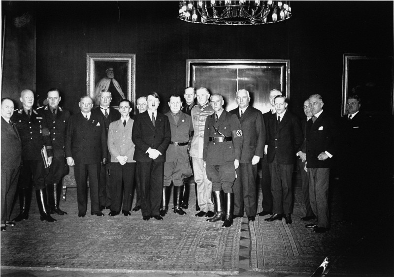 Adolf Hitler poses with his cabinet shortly after assuming power as chancellor of Germany. Hitler is flanked by Joseph Goebbels (left) and Hermann Göring (right). Berlin, Germany, 1933.