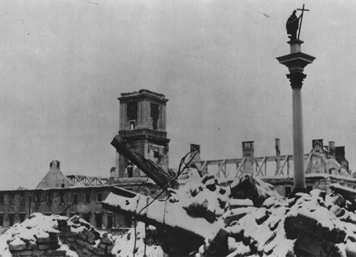 The Sigismund Monument stands amid rubble in the Polish capital after Germany's Blitzkrieg assault.