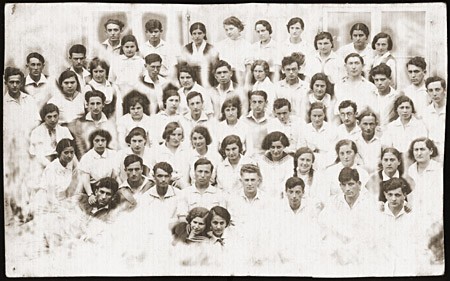Group portrait of the members of the Zionist pioneer youth group, Ha-Shomer ha-Tsa'ir Hachshara. Kalisz, Poland, May 1, 1935.