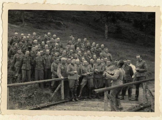 A "sing-along" during a social gathering of the SS hierarchy at Solahütte. [LCID: 34739]