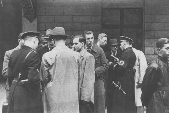 SS and Nazi police prepare for a raid on the Jewish community offices in Vienna. [LCID: 65636a]
