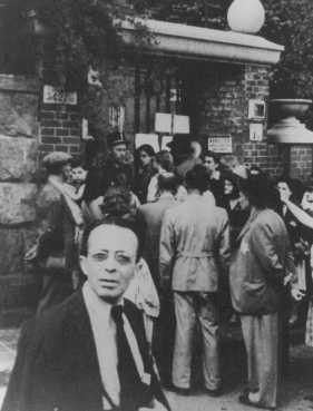 Hungarian Jews wait in front of the Swedish legation main office in hopes of obtaining Swedish protective passes. [LCID: 74025]