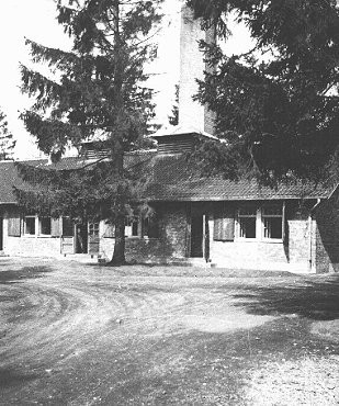 View of the crematorium building at the Dachau concentration camp. [LCID: 08057]