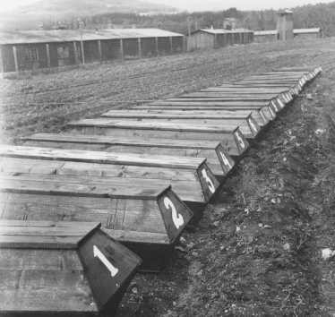 <p>Coffins of prisoners who died on a death march from Johanngeorgenstadt, a subcamp of Flossenbürg, to Theresienstadt. Nova Role, Czechoslovakia, after April 16, 1945.</p>
