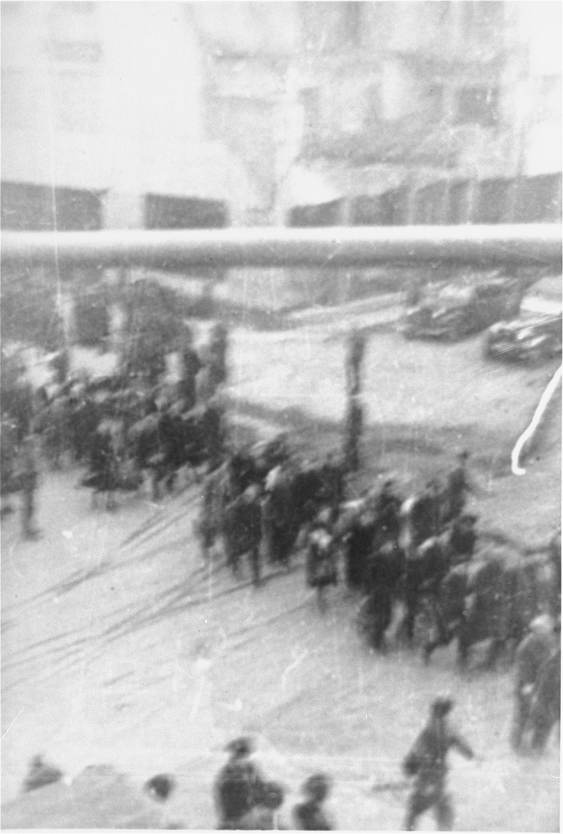 Deportation of Jews from the Warsaw ghetto during the uprising. [LCID: 80088]
