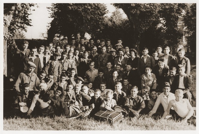 Group portrait of Jewish displaced youth at the OSE (Oeuvre de Secours aux Enfants) home for Orthodox Jewish children in Ambloy. Elie Wiesel is among those pictured. Ambloy, France, 1945.