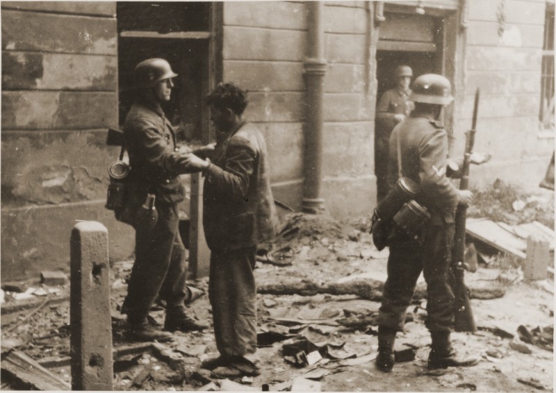 A captured Jewish resistance fighter who was forced out of his hidden bunker by German soldiers during the Warsaw ghetto uprising.