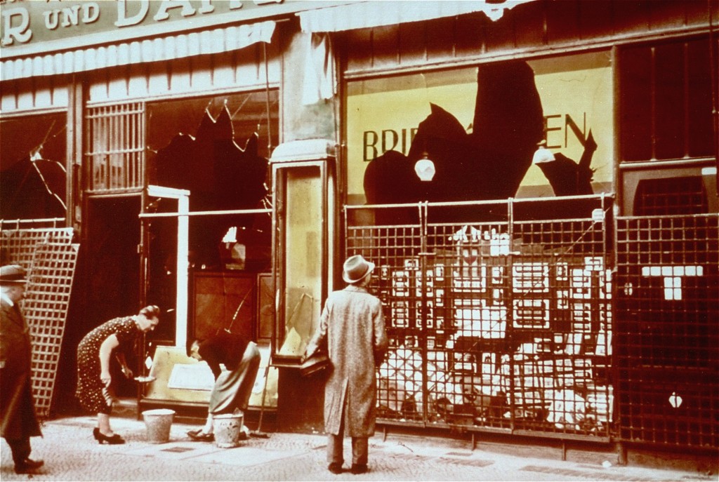 Storefronts of Jewish-owned businesses damaged during the Kristallnacht ("Night of Broken Glass") pogrom. Berlin, Germany, November 10, 1938.