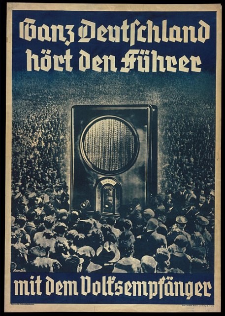 1936 poster:  "All of Germany Listens to the Führer with the People's Radio." [LCID: p533a]