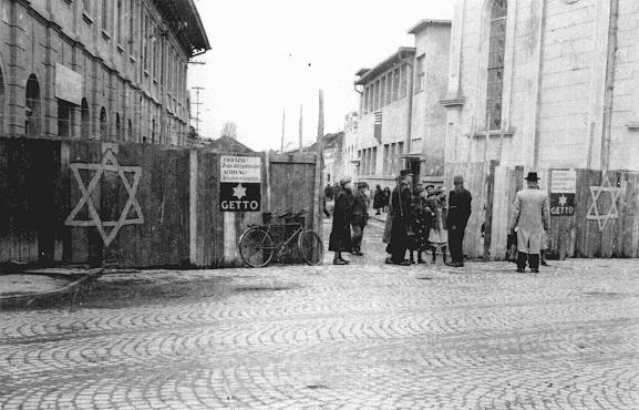 Guards check the identification papers of women entering the ghetto in Munkacs, in a part of Czechoslovakia annexed by Hungary in 1938.