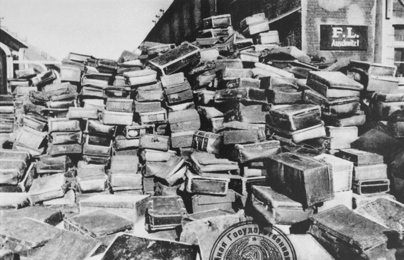 Suitcases that belonged to people deported to the Auschwitz camp. This photograph was taken after Soviet forces liberated the camp. Auschwitz, Poland, after January 1945.