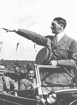 Hitler salutes the youth ranks at the Nazi Party Congress.
