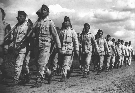 Conscripts in the Hungarian Labor Service march to a work site.