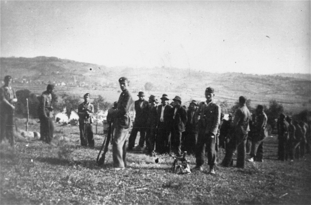 Ustasa (Croatian fascist) soldiers lead people to their execution in Herzegovina, in the pro-German fascist state of Croatia established following the partition of Yugoslavia.