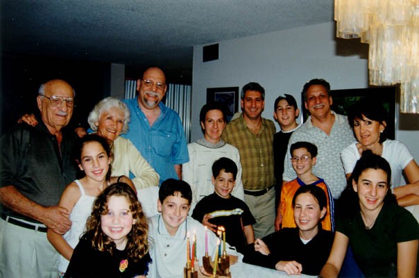The extended Derman family.  Top row, left to right: Aron, Lisa, Howard, Miriam, Daniel, Ari, Gordon, and Barbara (Howie's wife). [LCID: derm17]
