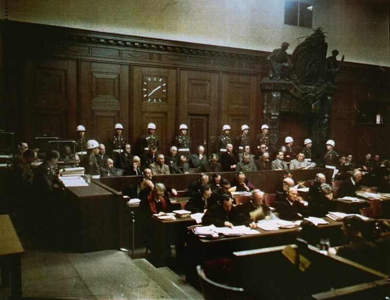 The accused and their defense attorneys at the International Military Tribunal courtroom. [LCID: 61324]