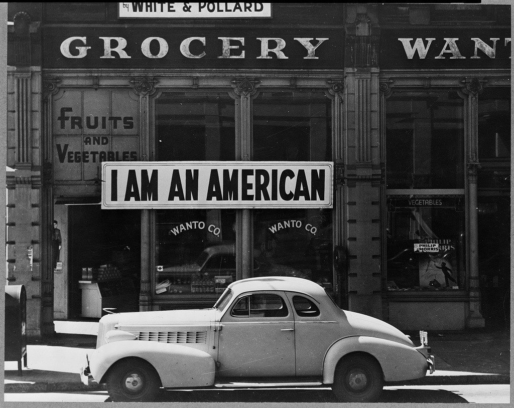 Tatsuro Matsuda, whose family owned the Wanto Co. grocery store, hung this sign in front of the store, Oakland, California, March 1942. The store was closed following orders for the evacuation of American residents of Japanese ancestry. Evacuees were forcibly deported to relocation centers.