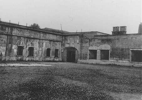 View of the courtyard in the Breendonk fortress prison where prisoners lined up for roll call. [LCID: 41207]