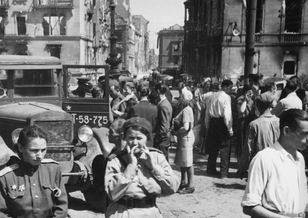 Soviet soldiers in a street in the Soviet occupation zone of Berlin following the defeat of Germany. [LCID: 04813]