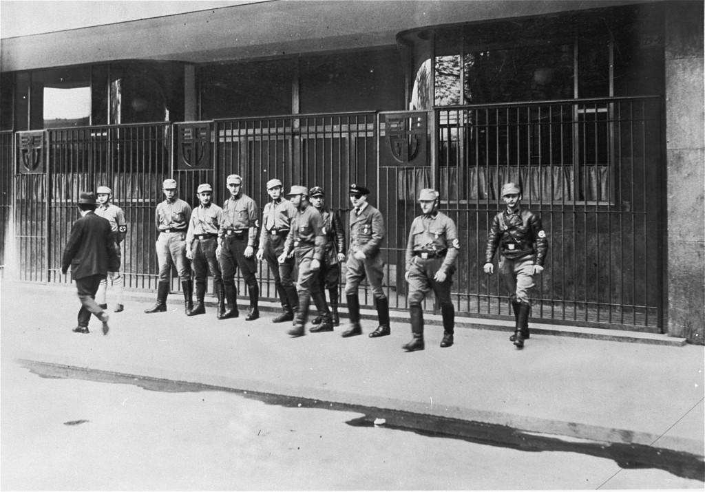 Nazi Storm Troopers (SA) block the entrance to a trade union building that they have occupied. SA detachments occupied union offices nationwide, forcing the dissolution of the unions. Berlin, Germany, May 2, 1933.
