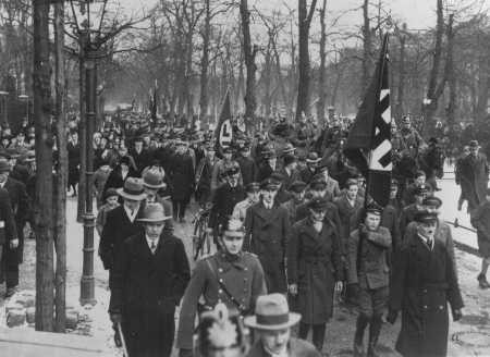 A march supporting the Nazi movement during an election campaign in 1932. [LCID: 45103]