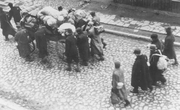 <p>German Jews move into the Lodz ghetto area. Poland, between April 1940 and 1942.</p>