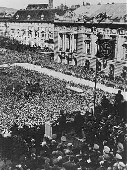 Hitler addresses a jubilant crowd on Vienna's Heldenplatz after Germany annexed Austria (the Anschluss). [LCID: 65595]