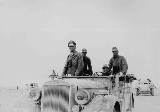 <p>القوات الألمانية, خلال حملة شمال إفريقيا, تحت قيادة النائب الجينيرال (مدير الشرطة من بعد ذلك) أرفين رومل. ليبيا. 1941.</p>