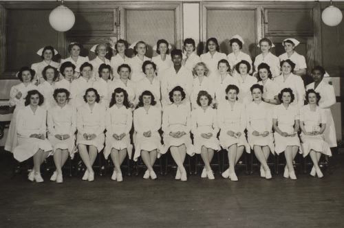 Blanka (middle row, third from right) graduates to become a pediatric nurse. [LCID: roth7]