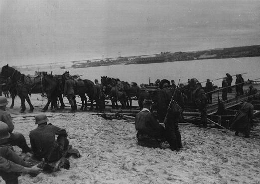 German forces and supplies at a river crossing on the way to the front. [LCID: 08779]