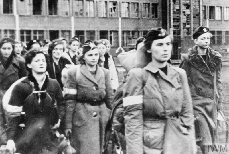<p>Soldiers of the Polish Home Army Women's Auxiliary Services, taken captive by the Germans in October 1944 as a result of <a href="/narrative/55299">the Warsaw Polish uprising</a>. After the uprising ended on October 2, the Germans took as prisoners of war more than 11,000 soldiers of the Polish Home Army.</p>