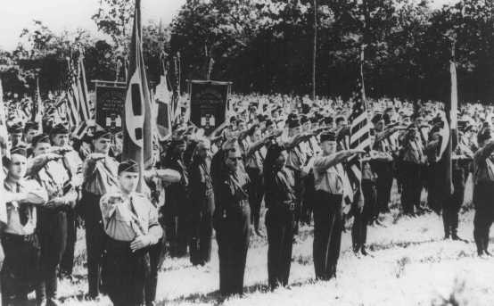 Members of the pro-Nazi German American Bund and the pro-Fascist Italian Blackshirts give the Nazi salute. [LCID: 00579]
