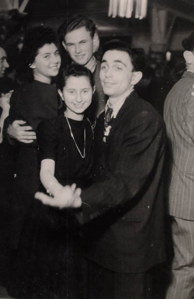 Regina (top, left) with friends at a dance in Berlin. [LCID: gelb21]