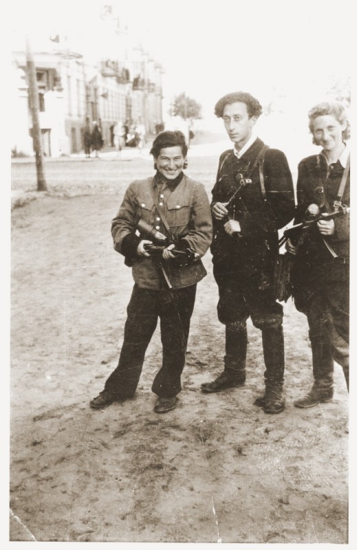 Jewish partisans Rozka Korczak (left), Abba Kovner, and Vitka Kempner in Vilna after the city was liberated. [LCID: 76842]