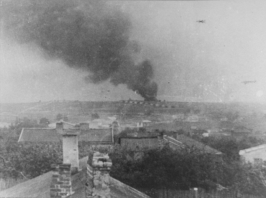 View of Majdanek camp from a nearby village. The smoke could be from the burning of corpses. [LCID: 83854]
