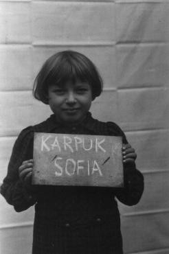 A girl in the Kloster Indersdorf children's center who was photographed in an attempt to help locate surviving relatives. [LCID: 86765]