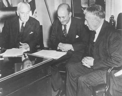 Photo taken in Secretary of State Cordell Hull's office on the occasion of the third meeting of the War Refugee Board. [LCID: 85938]