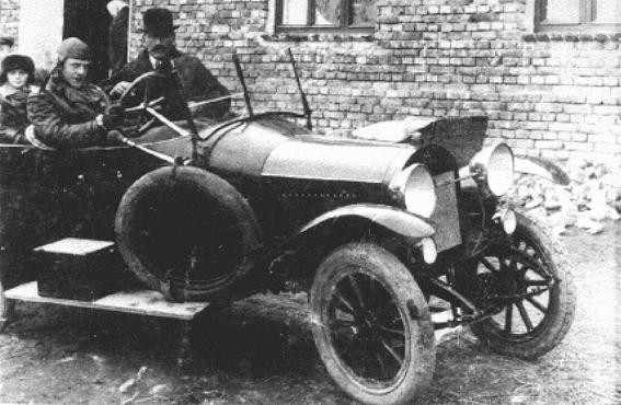 Oskar Schindler (at wheel) with his father, Hans. [LCID: 03380]