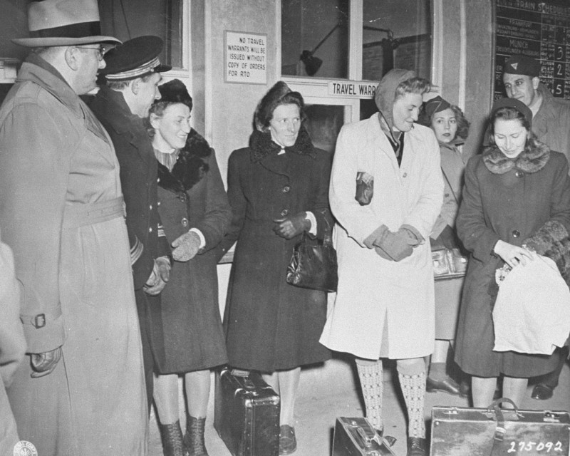 Four Polish women arrive at the Nuremberg train station to serve as prosecution witnesses at the Doctors Trial. [LCID: 43033]