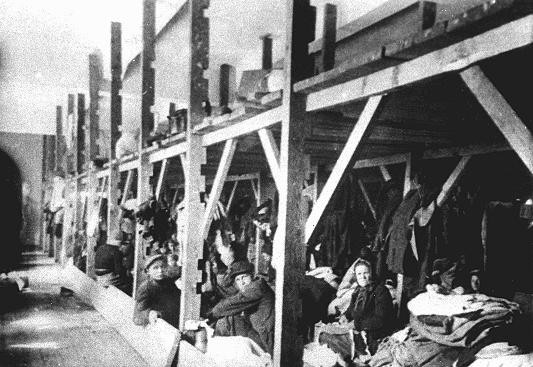 Jews from Bulgarian-occupied Macedonia and Thrace interned in the "Monopol" tobacco factory, which was was used as a transit camp.