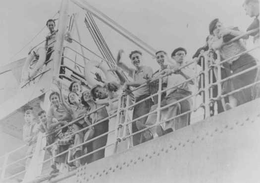 Jewish refugee youth sail for Palestine from an Italian port on the Aliyah Bet ("illegal" immigration) ship "Parita." [LCID: 86614]