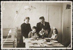 Gavra Mandil celebrates his fourth birthday with his parents, Mosa and Gabriela, and sister Irena. Novi Sad, Yugoslavia, September 6, 1940.