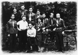 Group portrait of members of the Hashomer Hatzair Zionist youth movement in Kalisz, Poland, 1933.