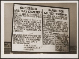A sign at the military cemetery in Gardelegen in memory of the prisoners who were killed by the SS in a barn near the town. Germany, April 18, 1945.