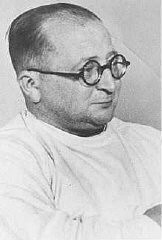 Nazi physician Carl Clauberg, who performed medical experiments on prisoners in Block 10 of the Auschwitz camp. Place and date uncertain.