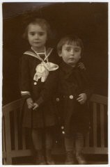 Prewar studio portrait in Sighet of Jewish siblings Suri and Ari Deutsch, both of whom died in the Holocaust. This photograph comes from the album of their cousin, Rosalia Dratler Roiter. Rosalia was deported to and died at Auschwitz. Sighet, Romania, 1937.